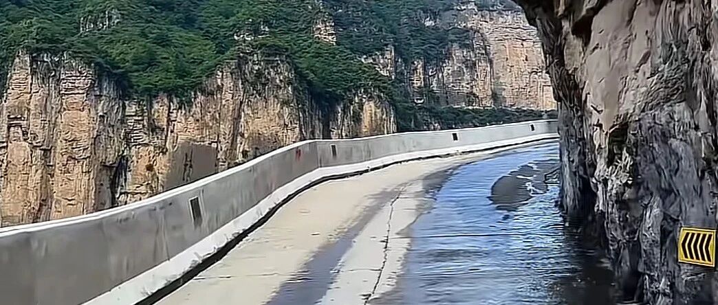 谁说电车爬不了山？这辆纯电轿车开上了太行绝壁